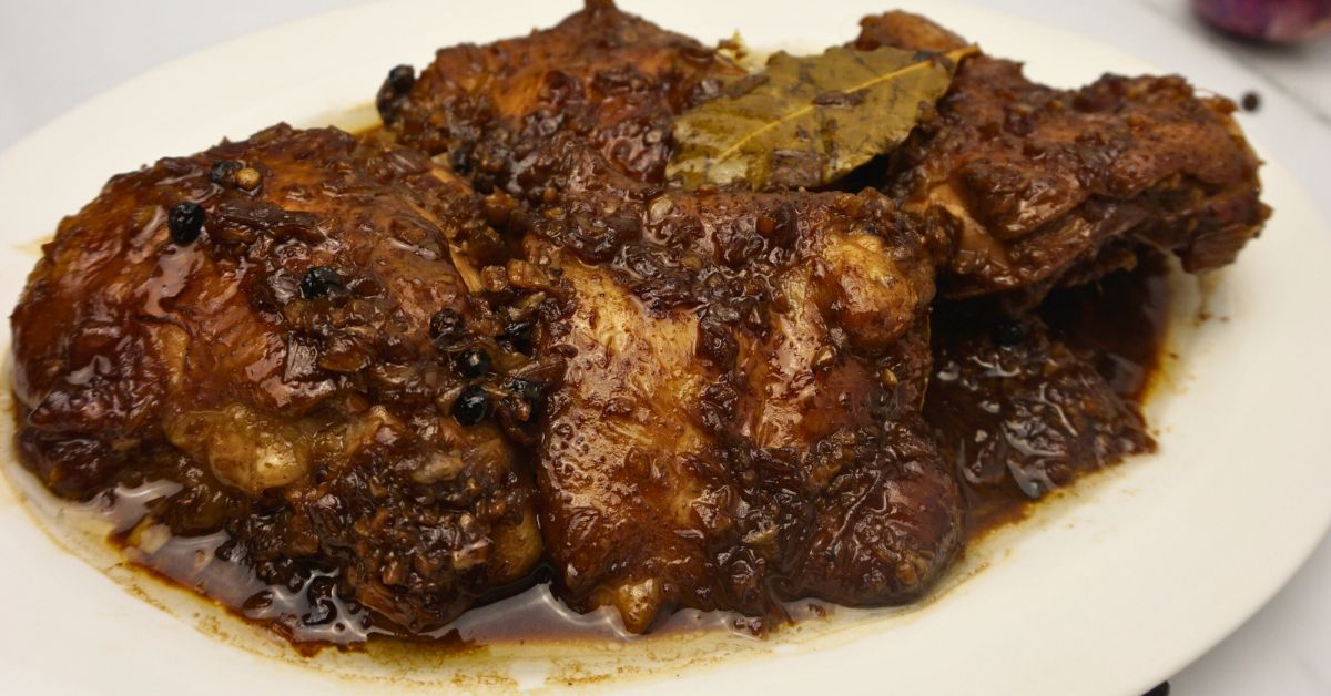 Chicken adobo in plate.