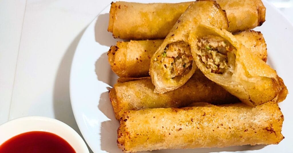 Lumpiang shanghai in saucer.