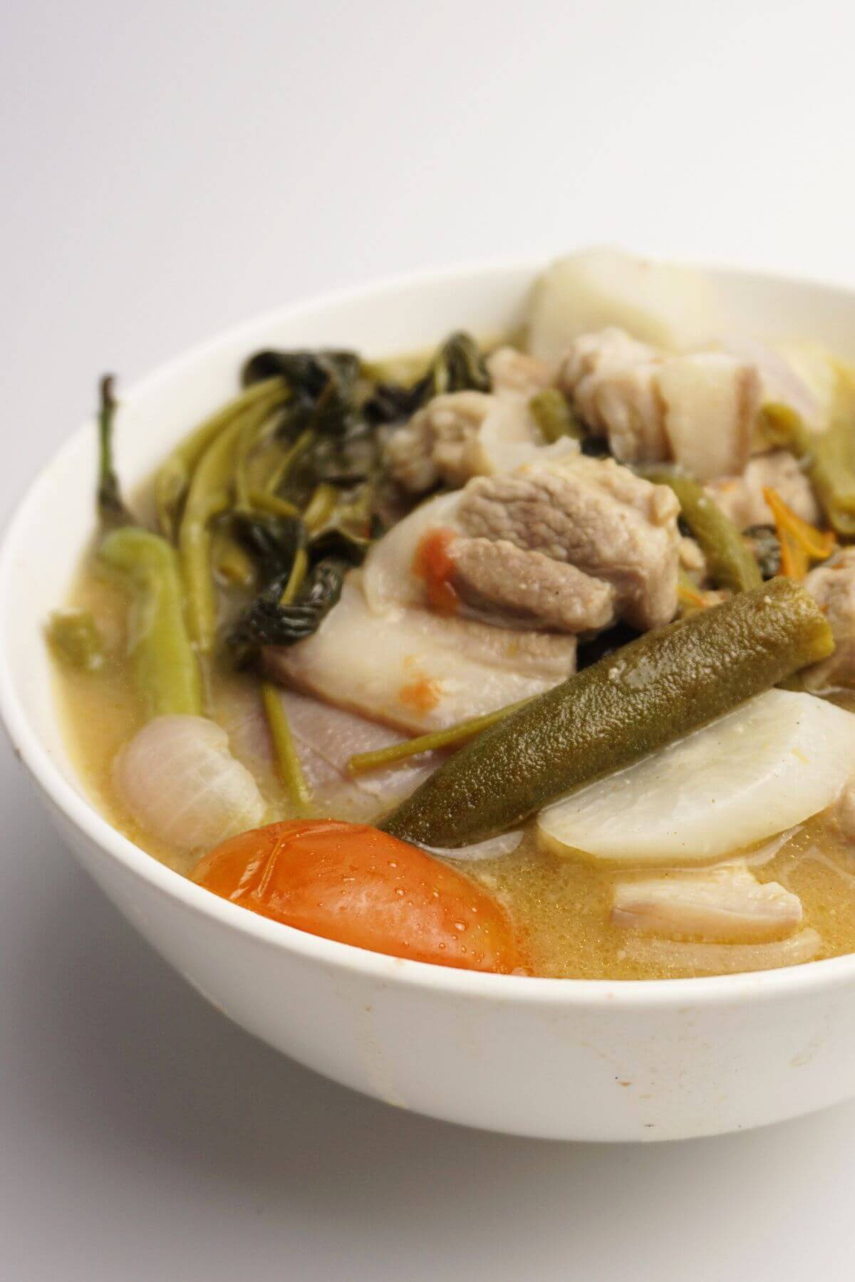 Pork sinigang in bowl.
