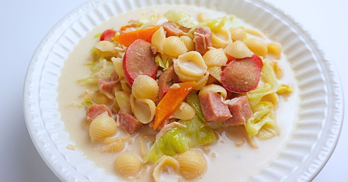 Serving of creamy sopas in a white bowl.