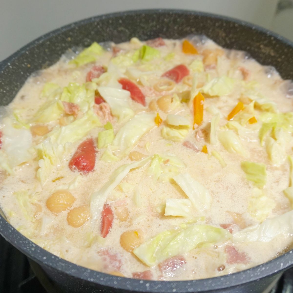 Chicken sopas in a pot.