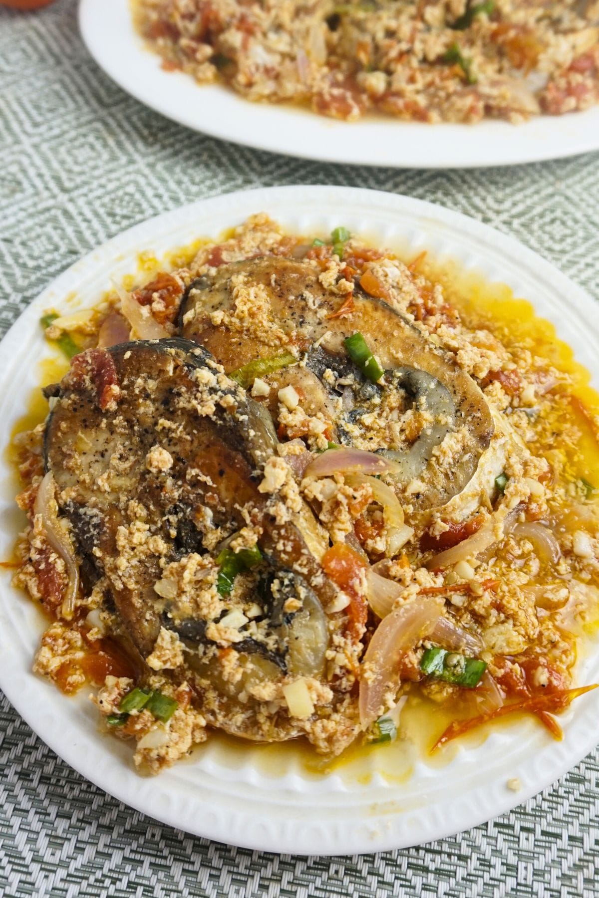 Milkfish sauteed in tomatoes and scrambled egg.