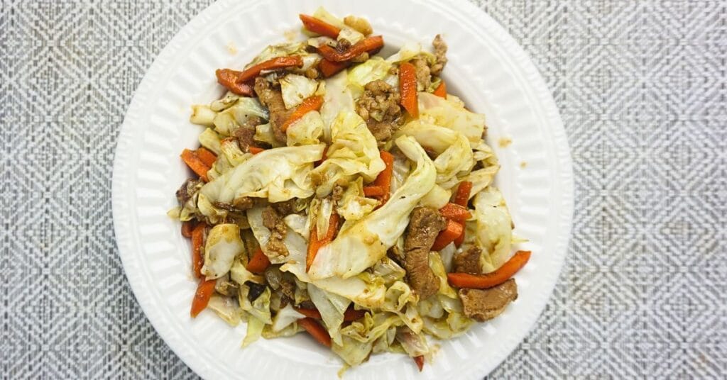 Sauteed cabbage and carrots in a plate.