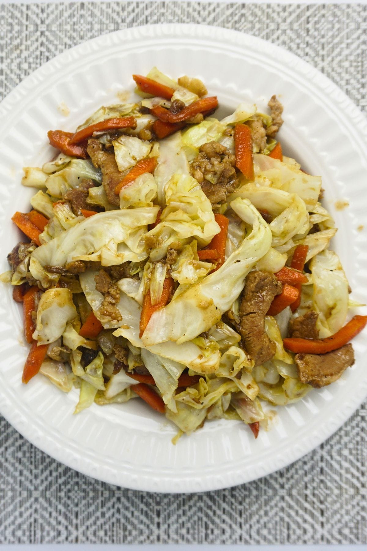Sauteed cabbage and carrots in soy sauce and oyster sauce.