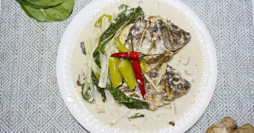 Ginataang tilapia in a plate.