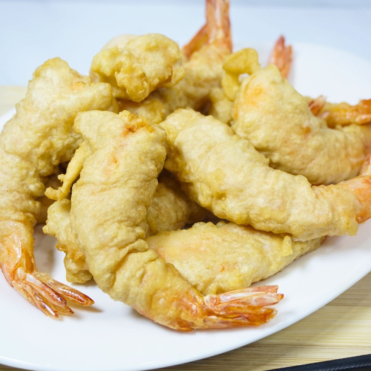 Deep fried shrimps coated in egg, flour and cornstarch.