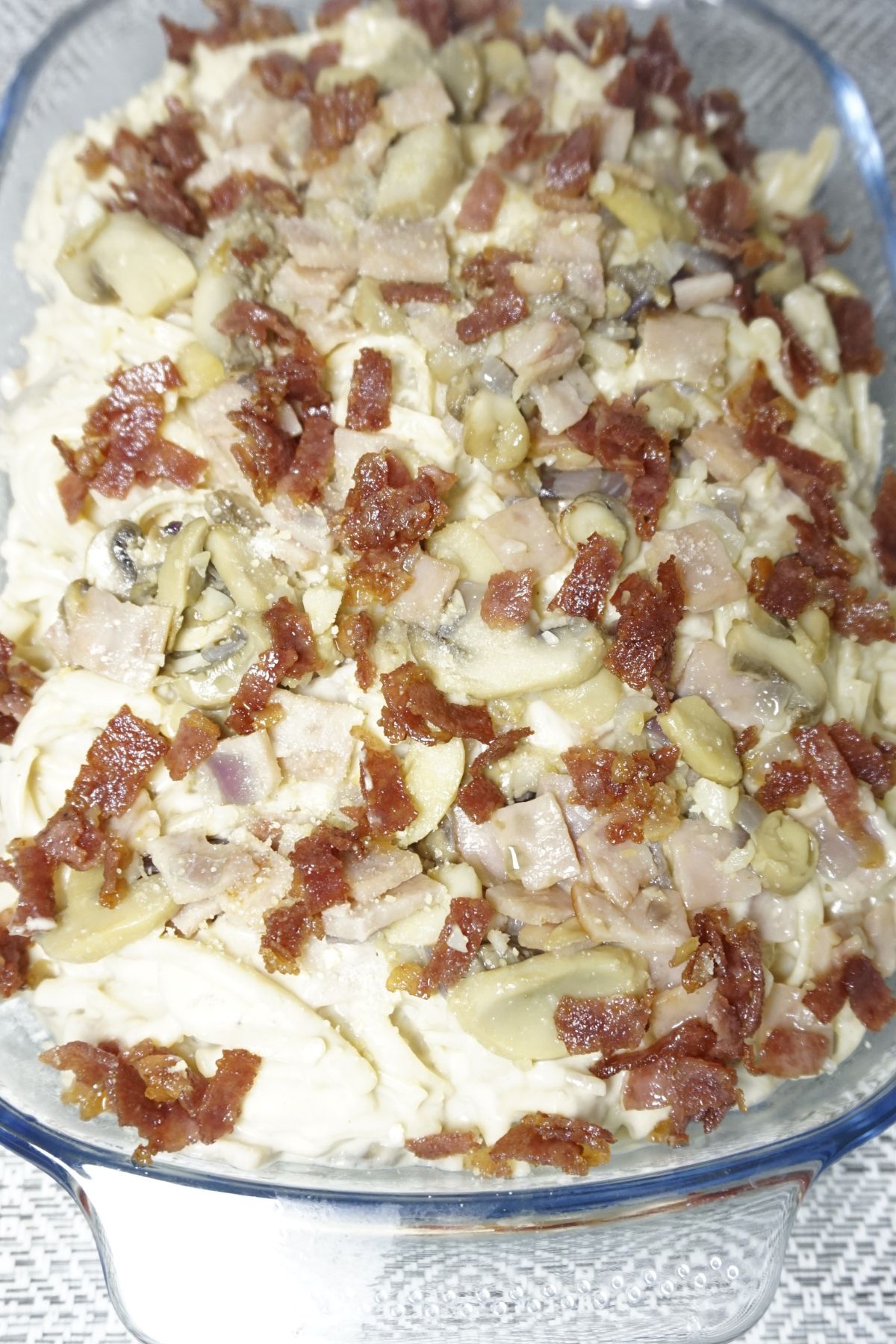 Creamy carbonara in baking dish