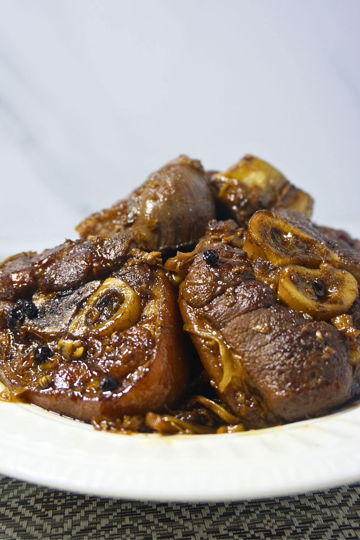 Pork leg sauteed in vinegar and soy sauce, sweetened with brown sugar.