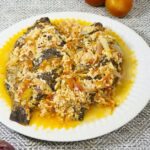 Fried tilapia in tomato sauce with egg.