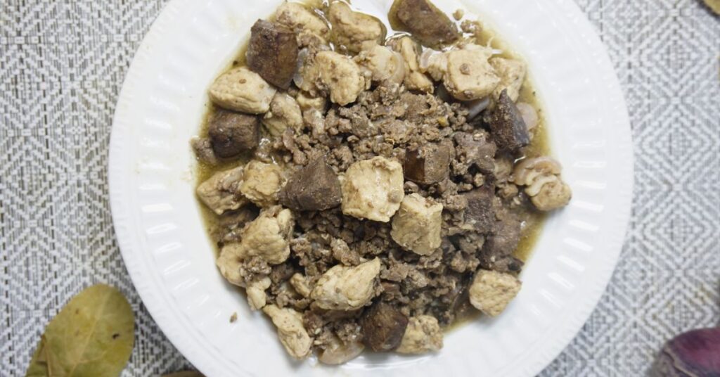 Top view of a plate of Kapampangan pork kilayin.