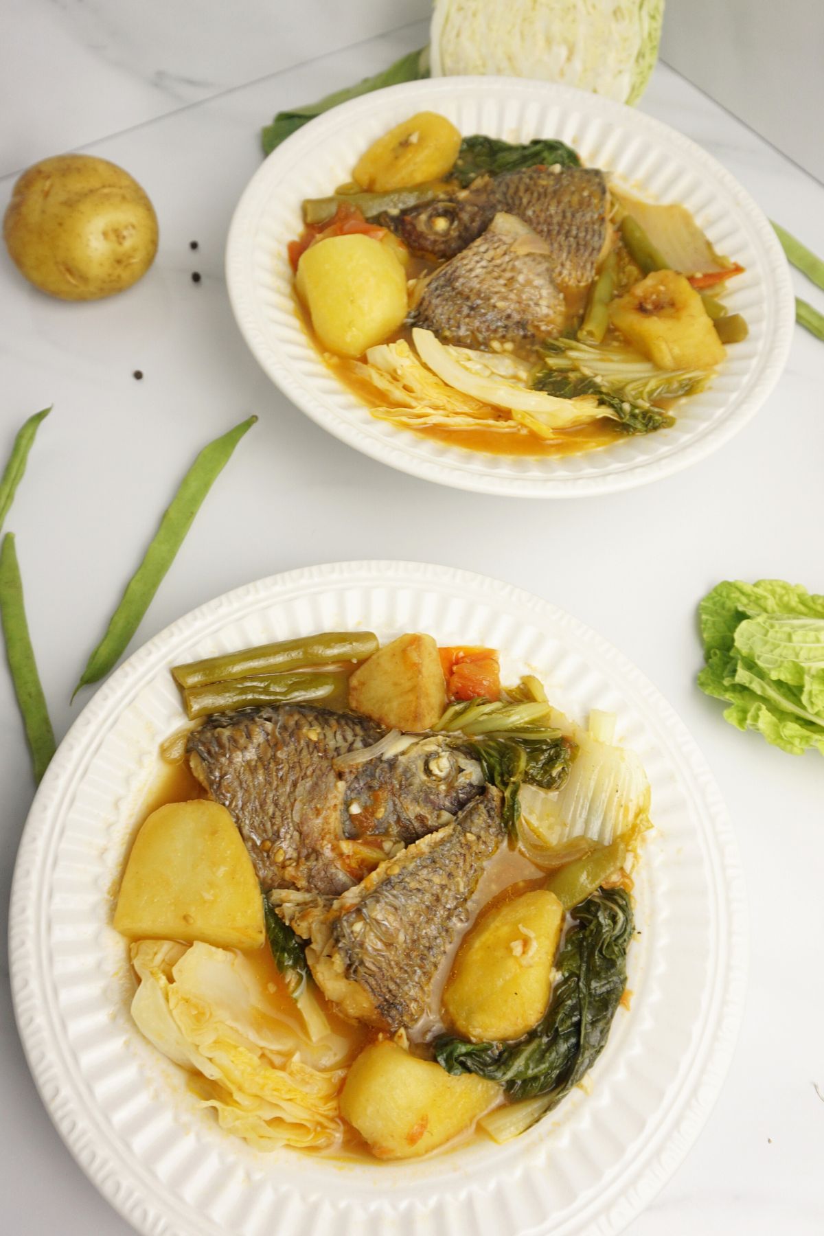 Servings of pocherong tilapia in plates.