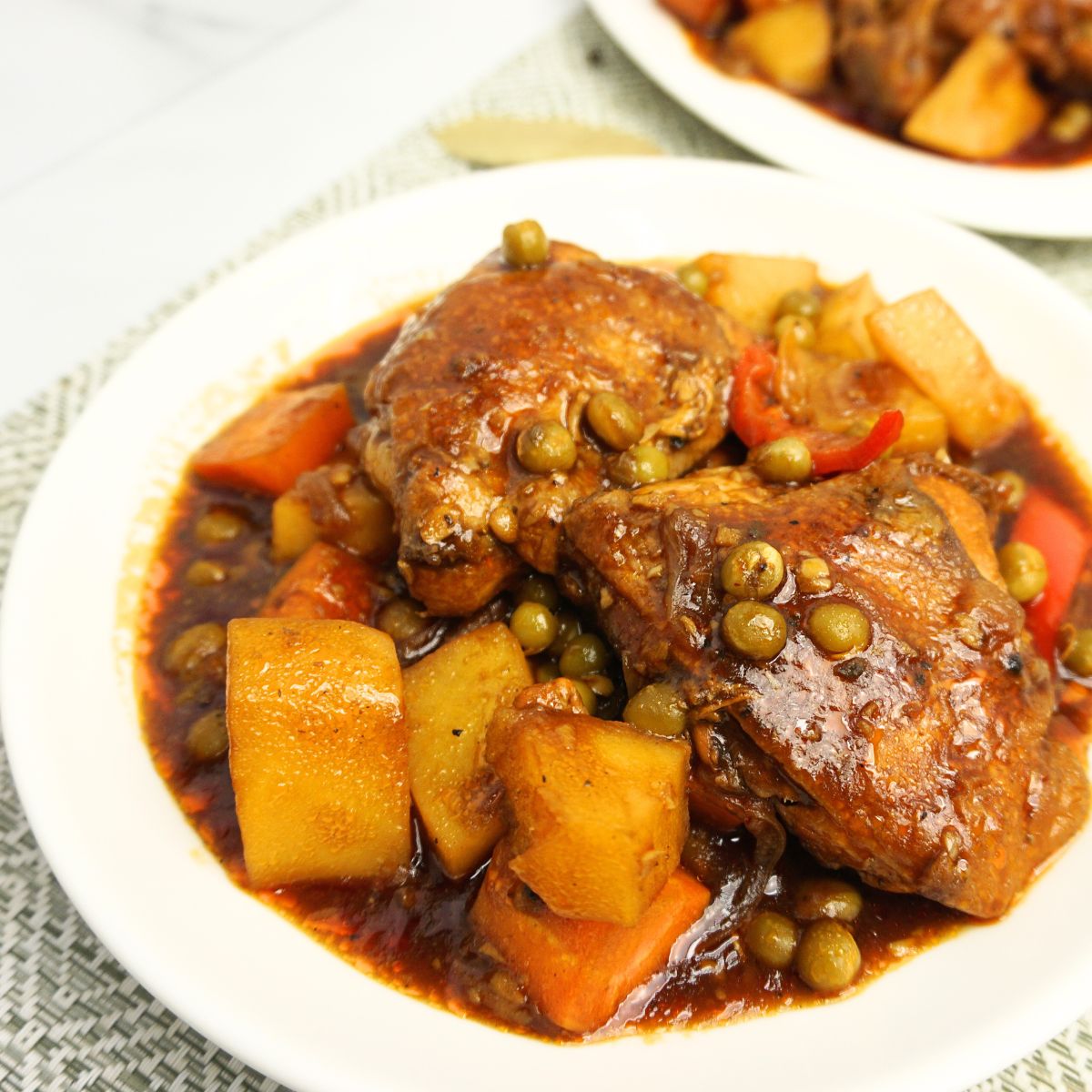 Saucy chicken afritada with vegetables