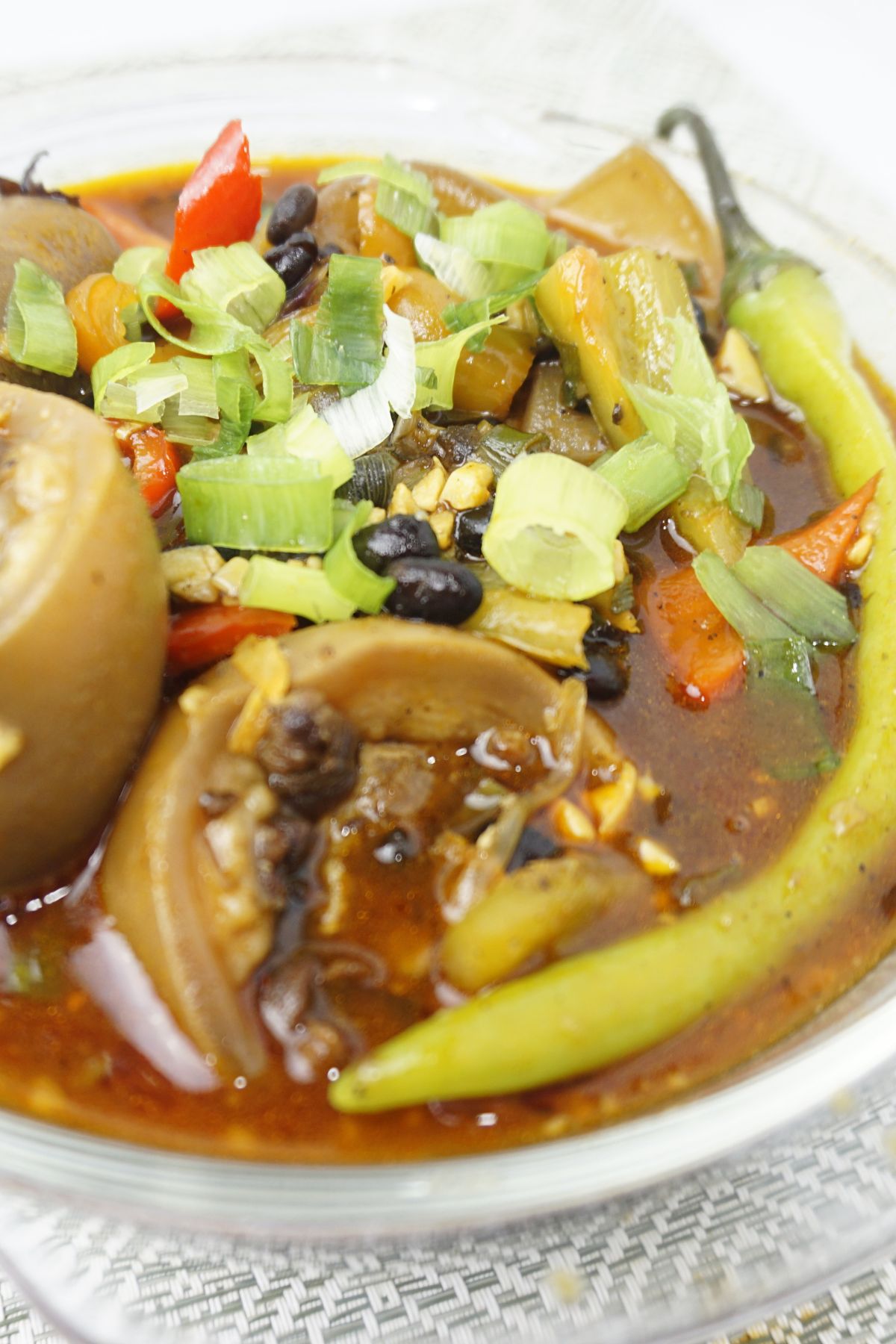 Warm balbacua serving in a glass bowl