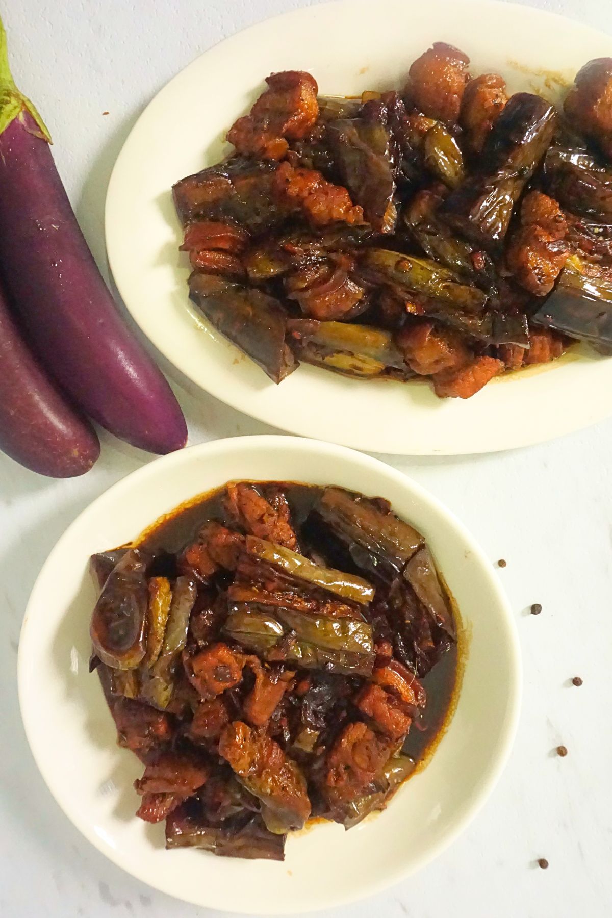 Overhead shots of adobong talong servings