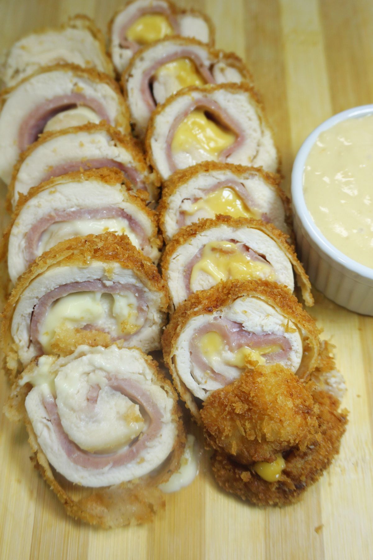 Breading coated sliced chicken cordon bleu