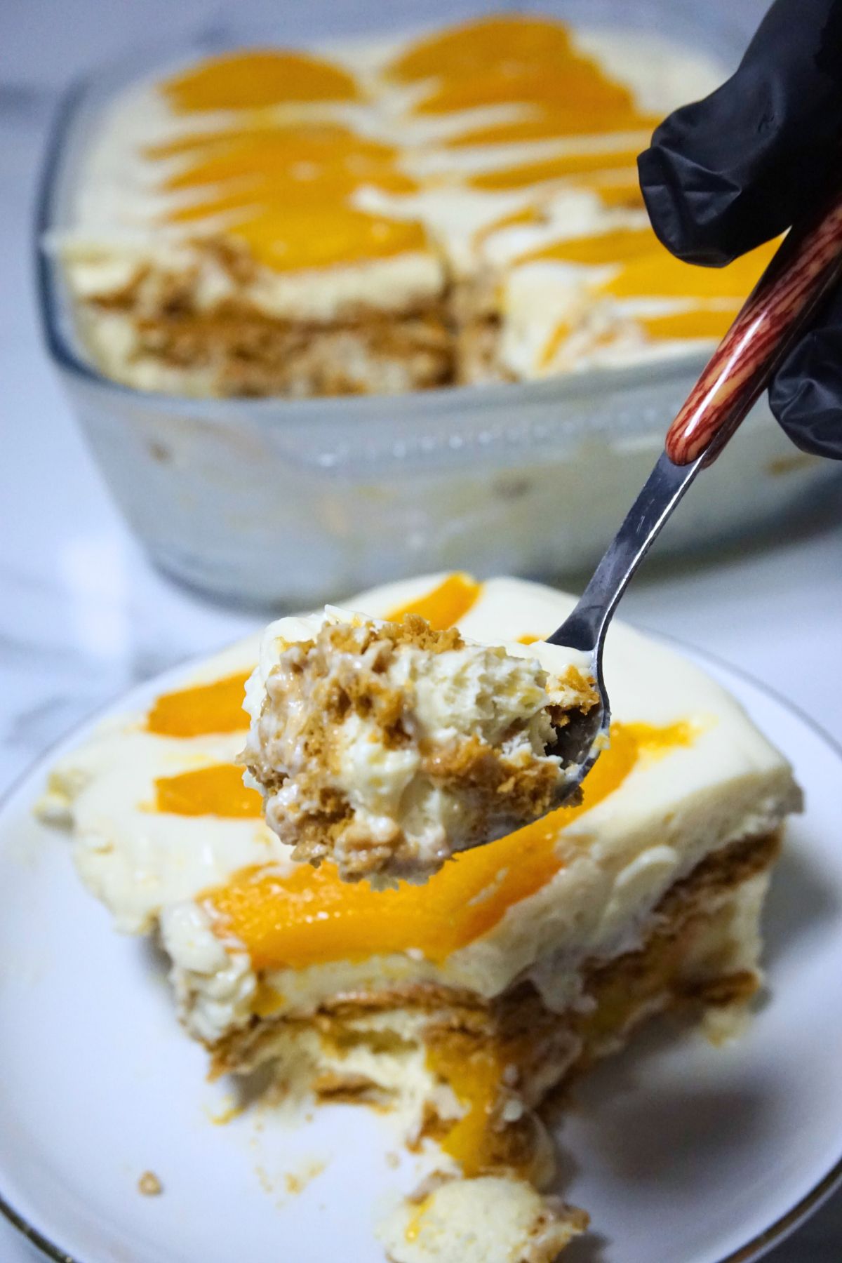 Spoonful of mango graham slice