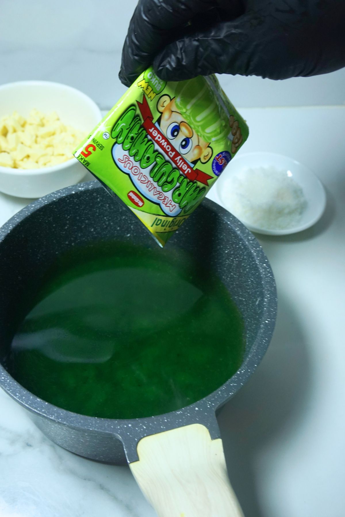 Pandan gulaman mix poured over pot