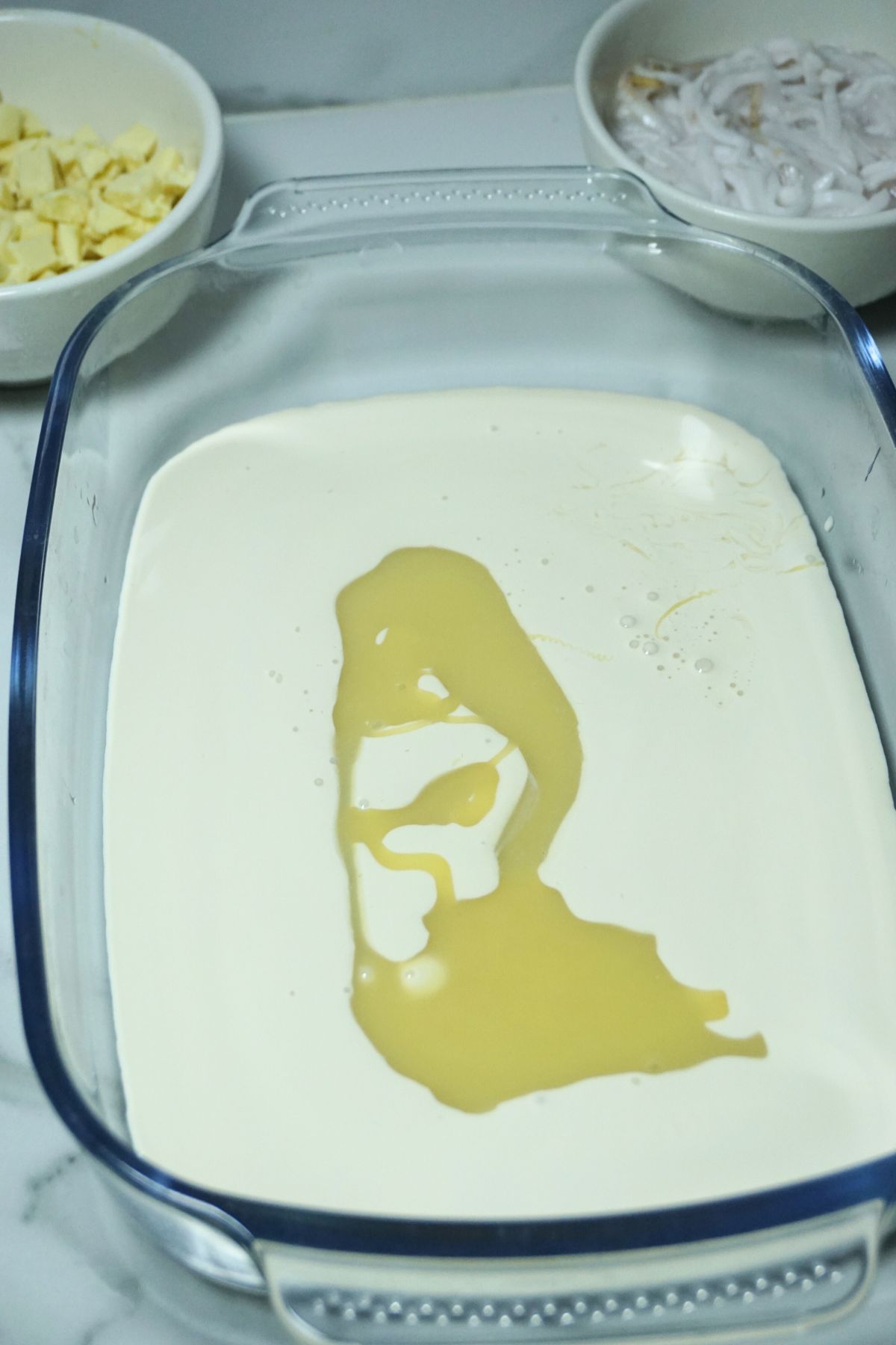 All purpose cream and condensed milk mix in a pan
