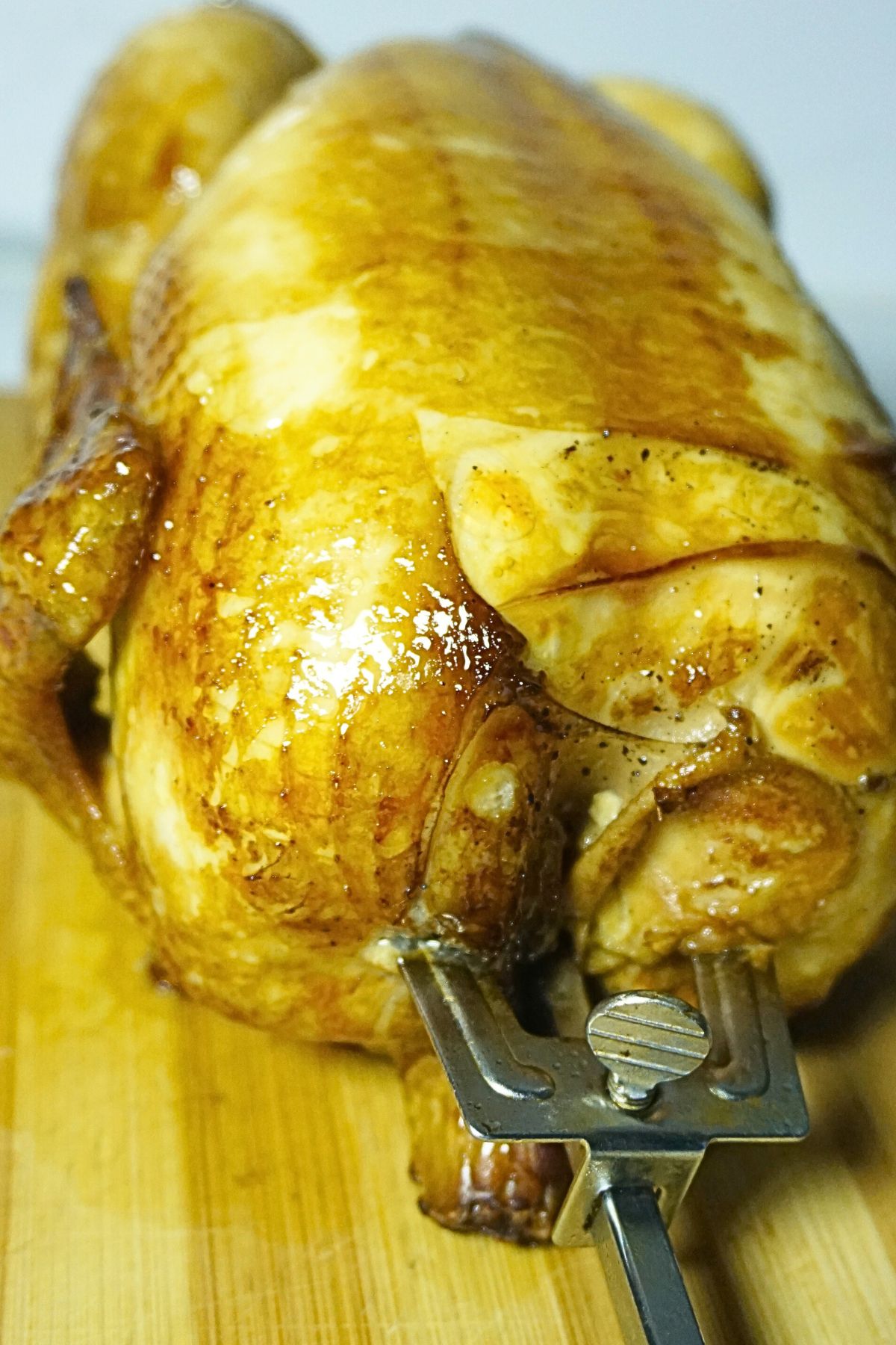 Lechon manok in a skewer