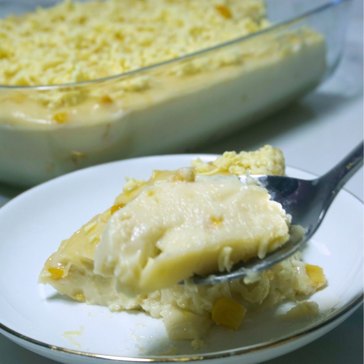 Spoonful of maja blanca serving