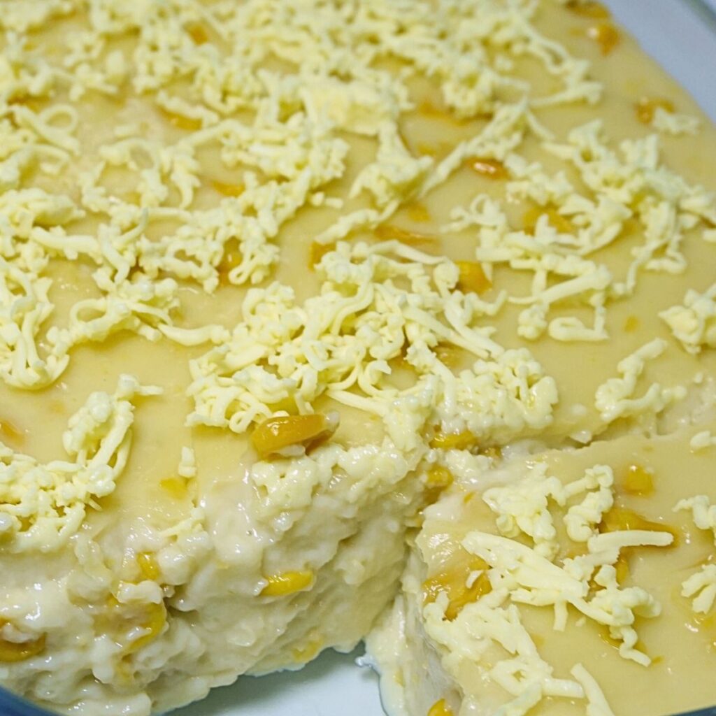 Creamy maja blanca topped with cheese