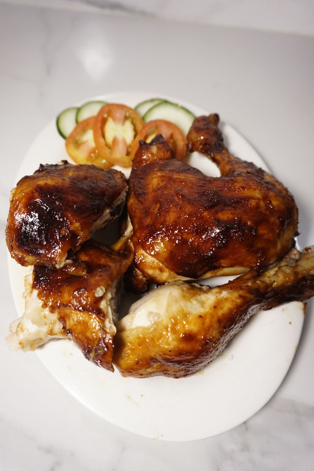 Chicken barbeque quarters served in plate