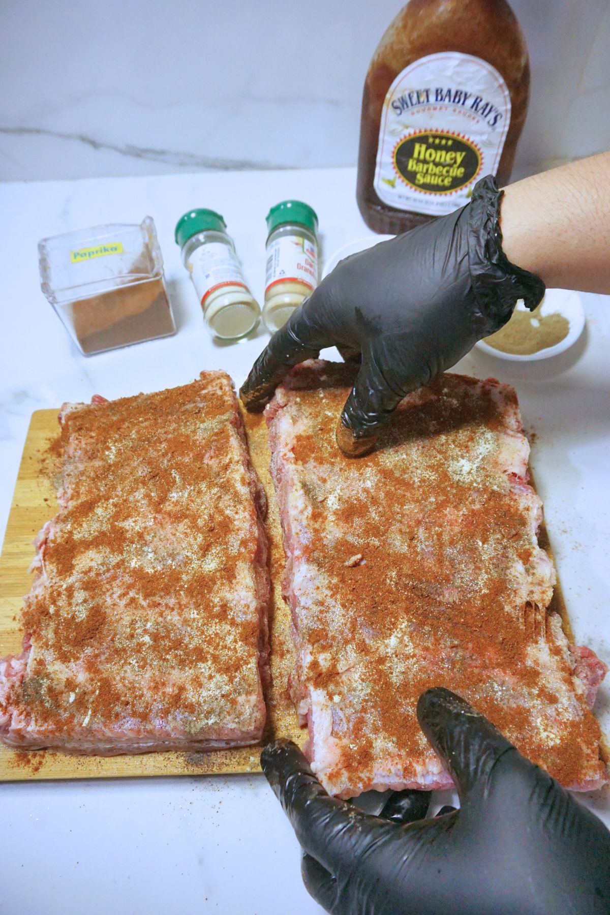 Spare ribs slab seasoned with dry rub spices