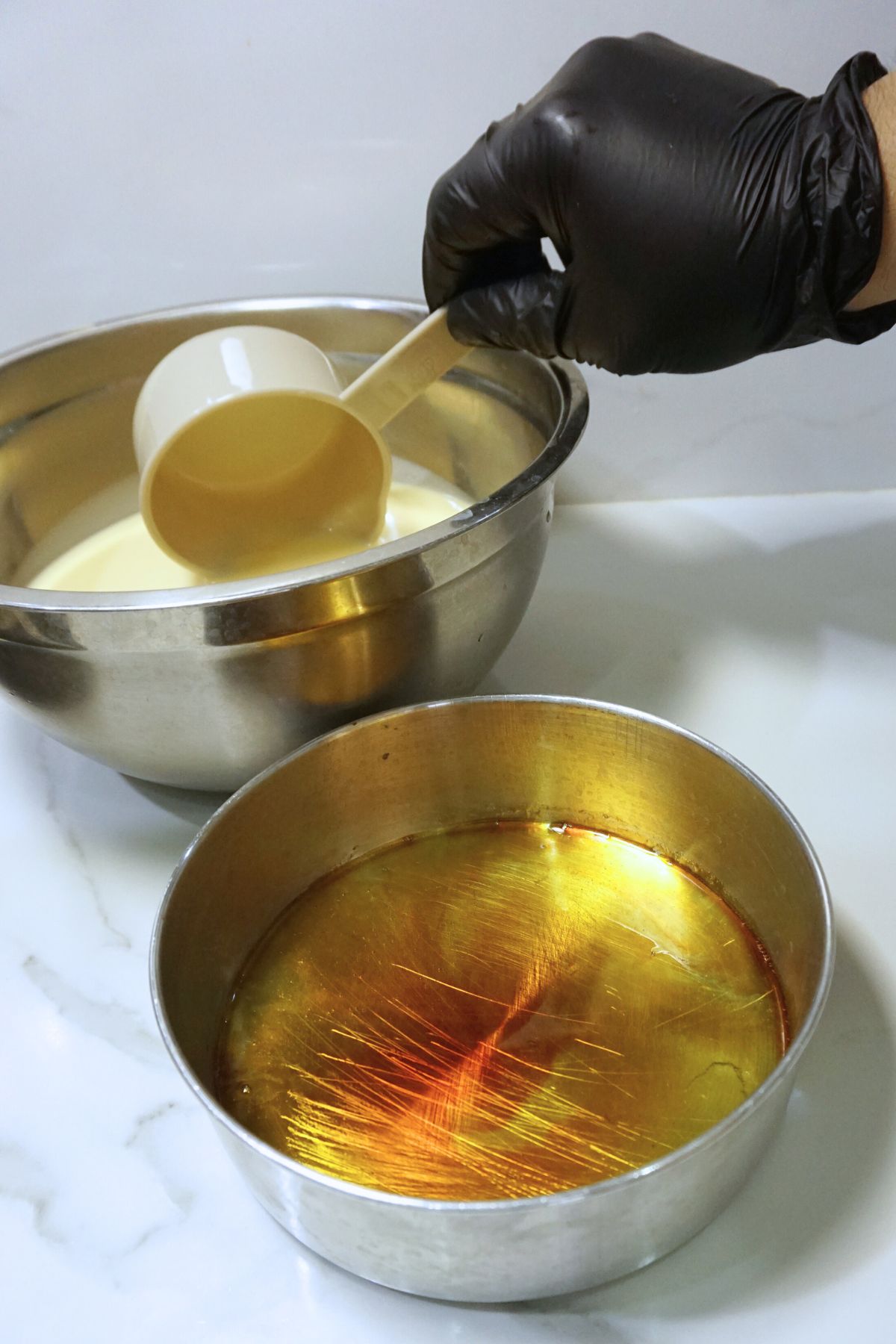 Leche flan mixture transfered to mold.