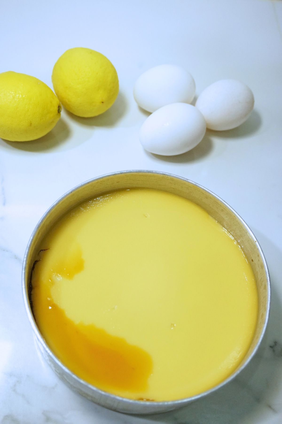 Cooked leche flan in a llanera
