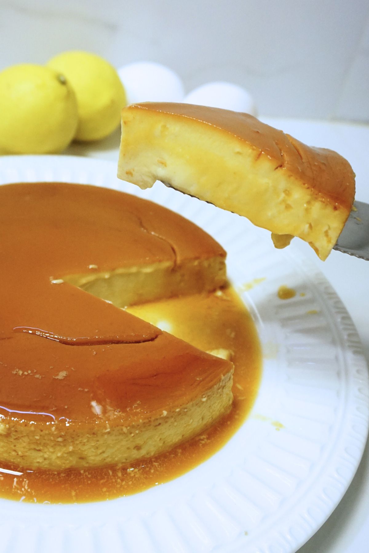 A slice of leche flan lifted
