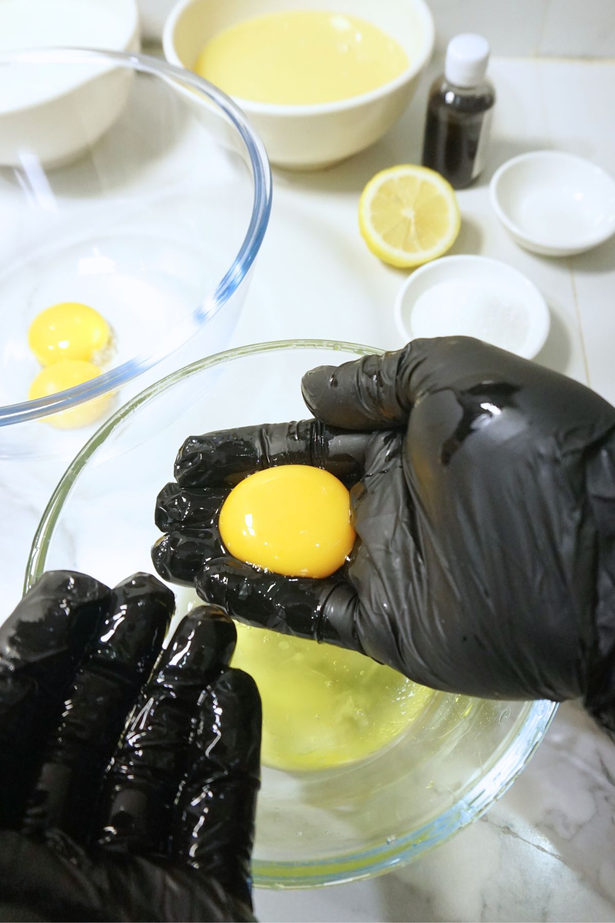 Process of separating egg yolk from white.