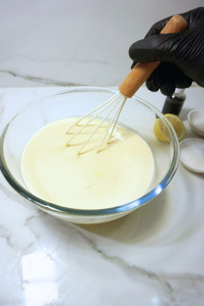 Whisked egg yolks with milk and condensed milk