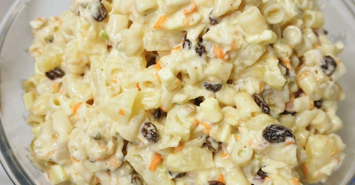 Macaroni salad serving in a white plate