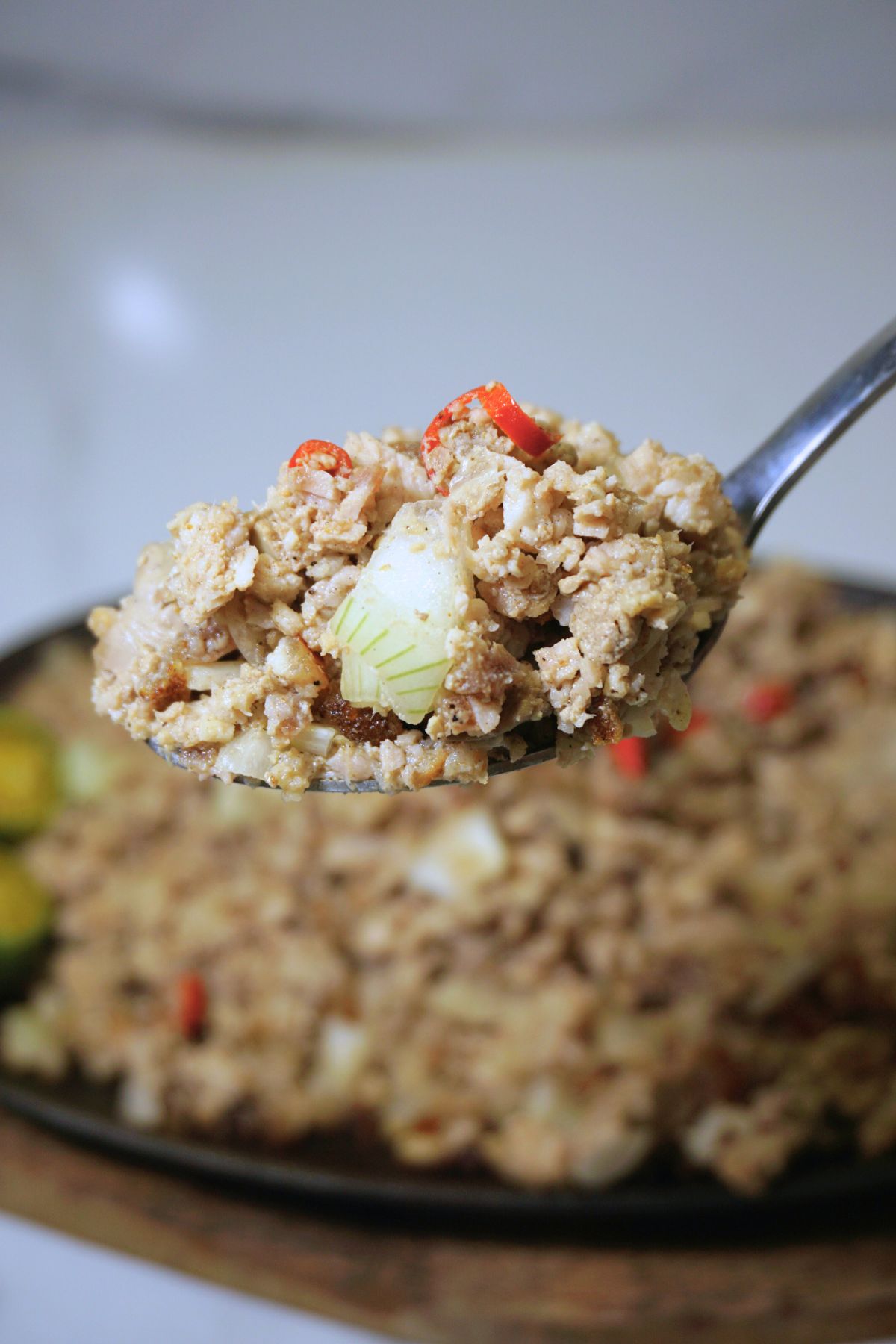 Spoonful of pork sisig
