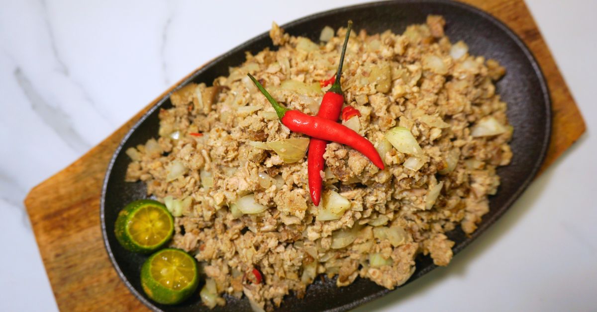 Sisig in sizzling plate